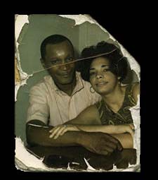 A man and woman are seated at a table